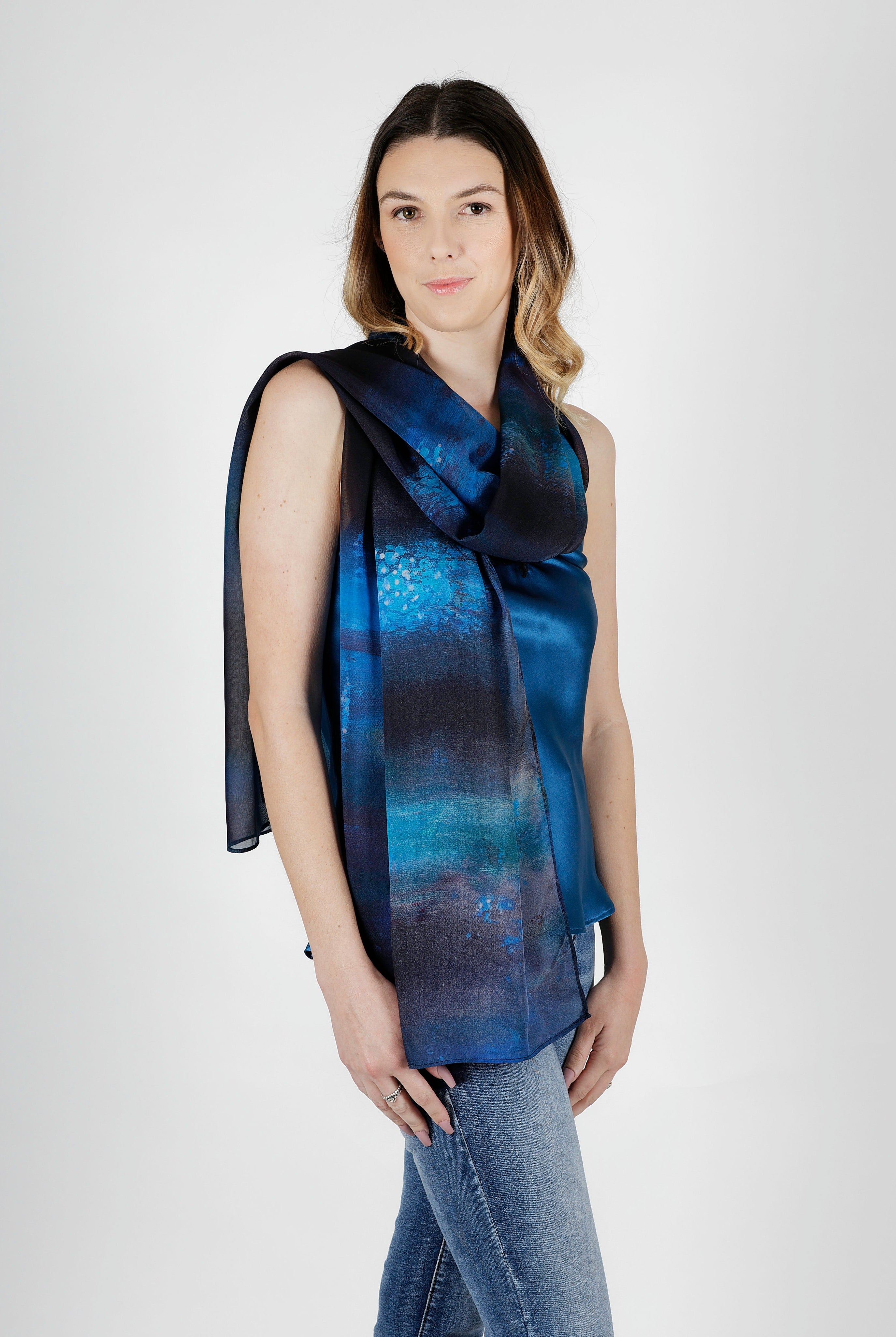 women wearing dark blue navy silk satin chiffon scarf with glow worm cave print