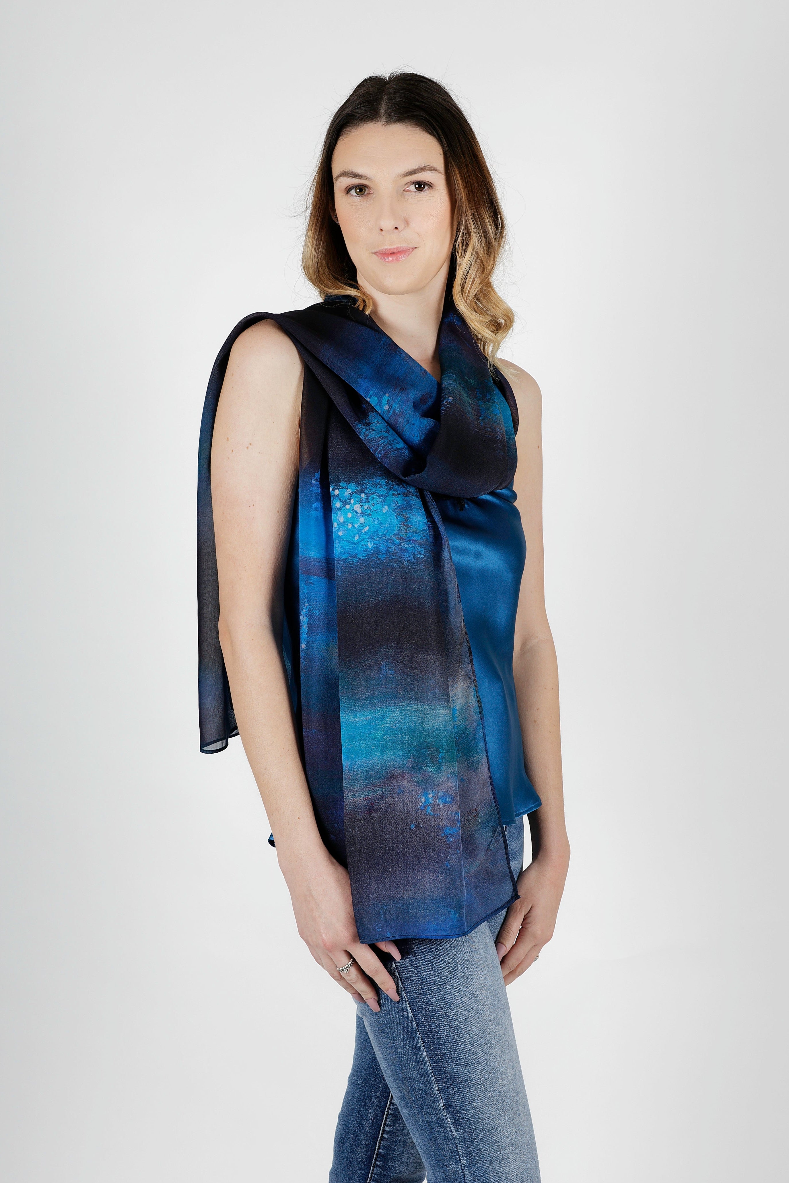 women wearing dark blue navy silk satin chiffon scarf with glow worm cave print