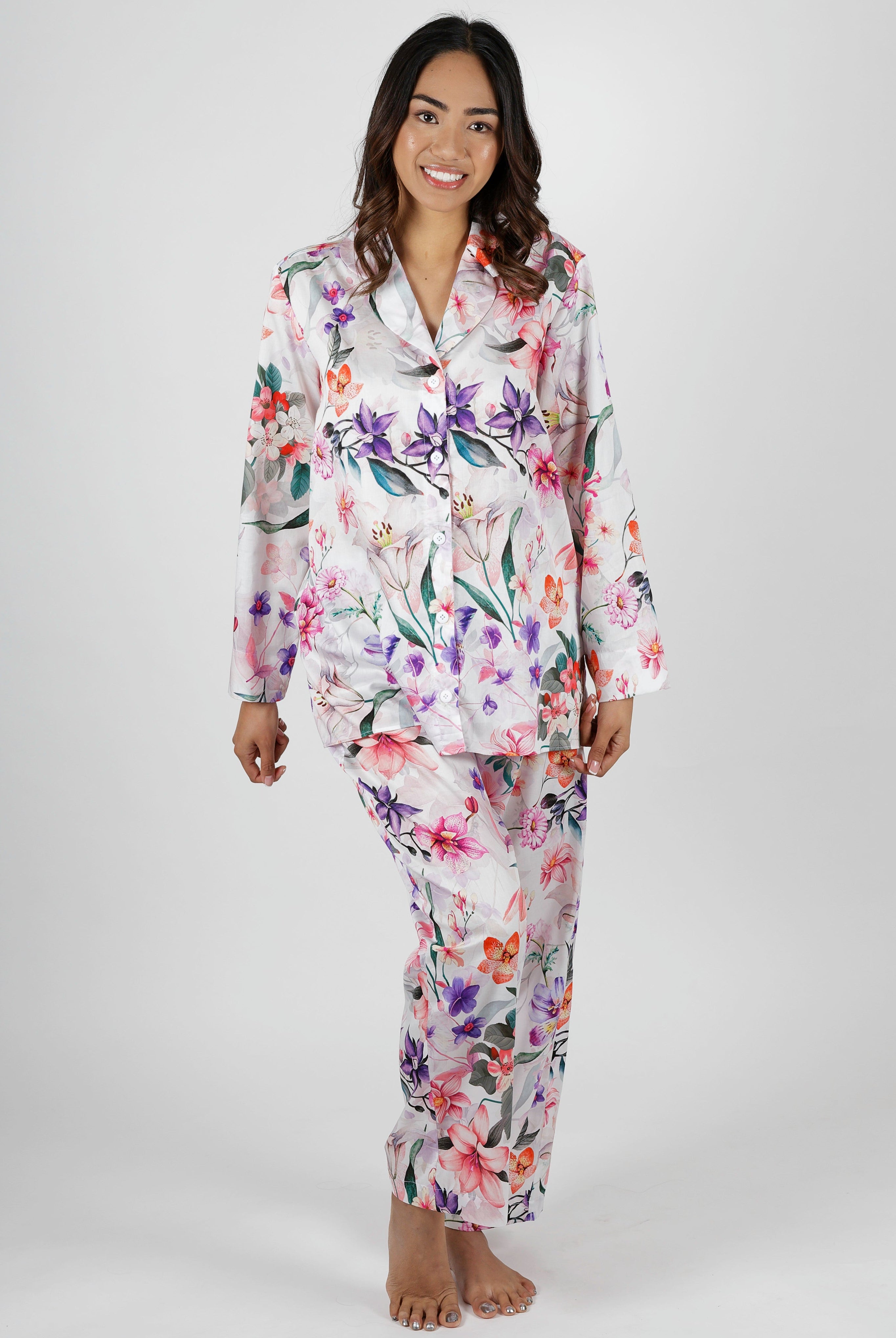 women wearing winter cotton floral pajamas with pink purple and orange flowers