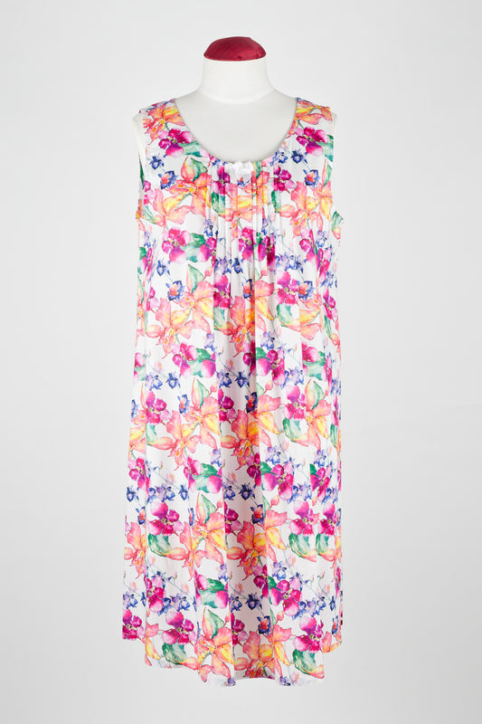 Colorful floral cotton nightie dress on a mannequin against a white background