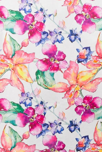 up close of cotton slip dress nightie with bright floral print in orange and pink flowers