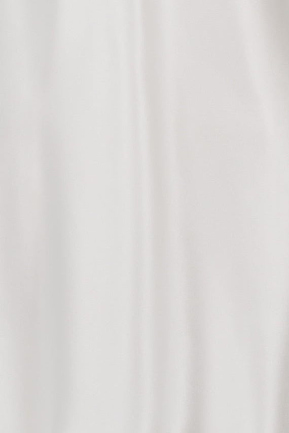 White sleeveless camisole on a mannequin against a white background
