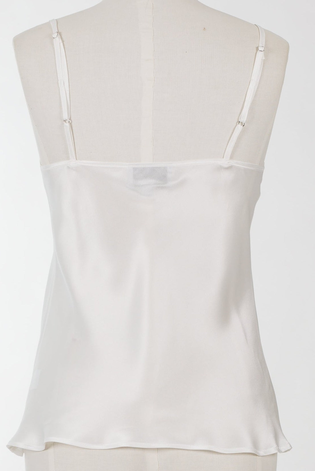 white silk cami on a mannequin