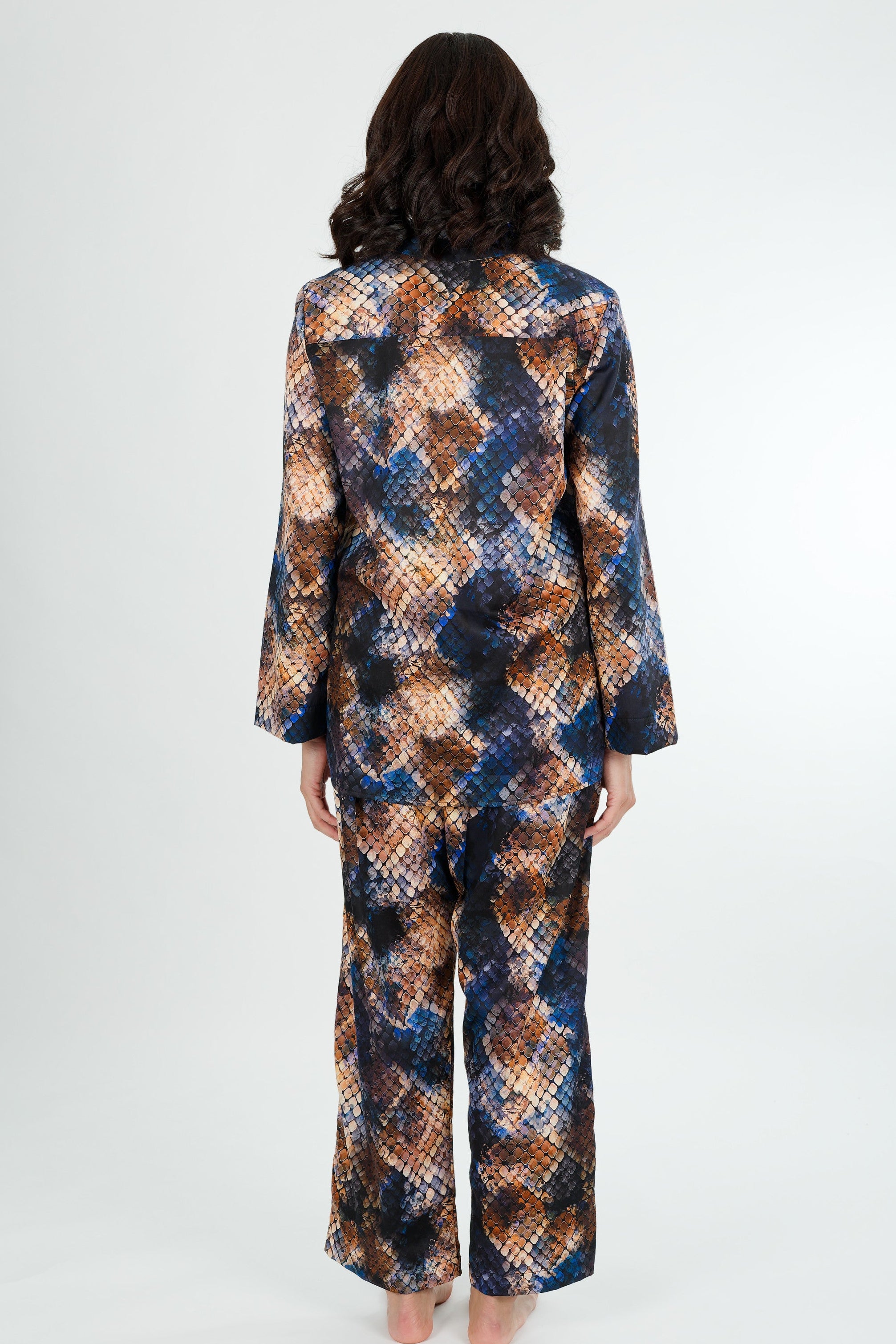 snake print of blue and gold cotton winter long sleeve pjs on a women