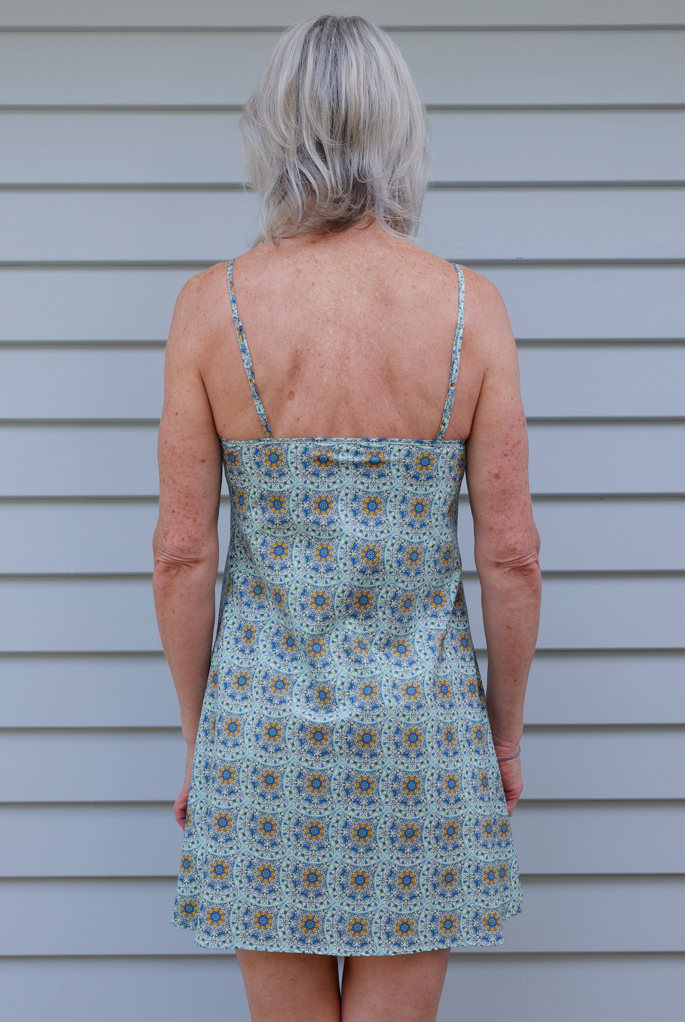 woman wearing cotton nightie dress with green and blue print