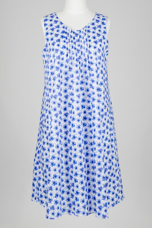 Blue floral cotton nightie dress on a mannequin against a gray background