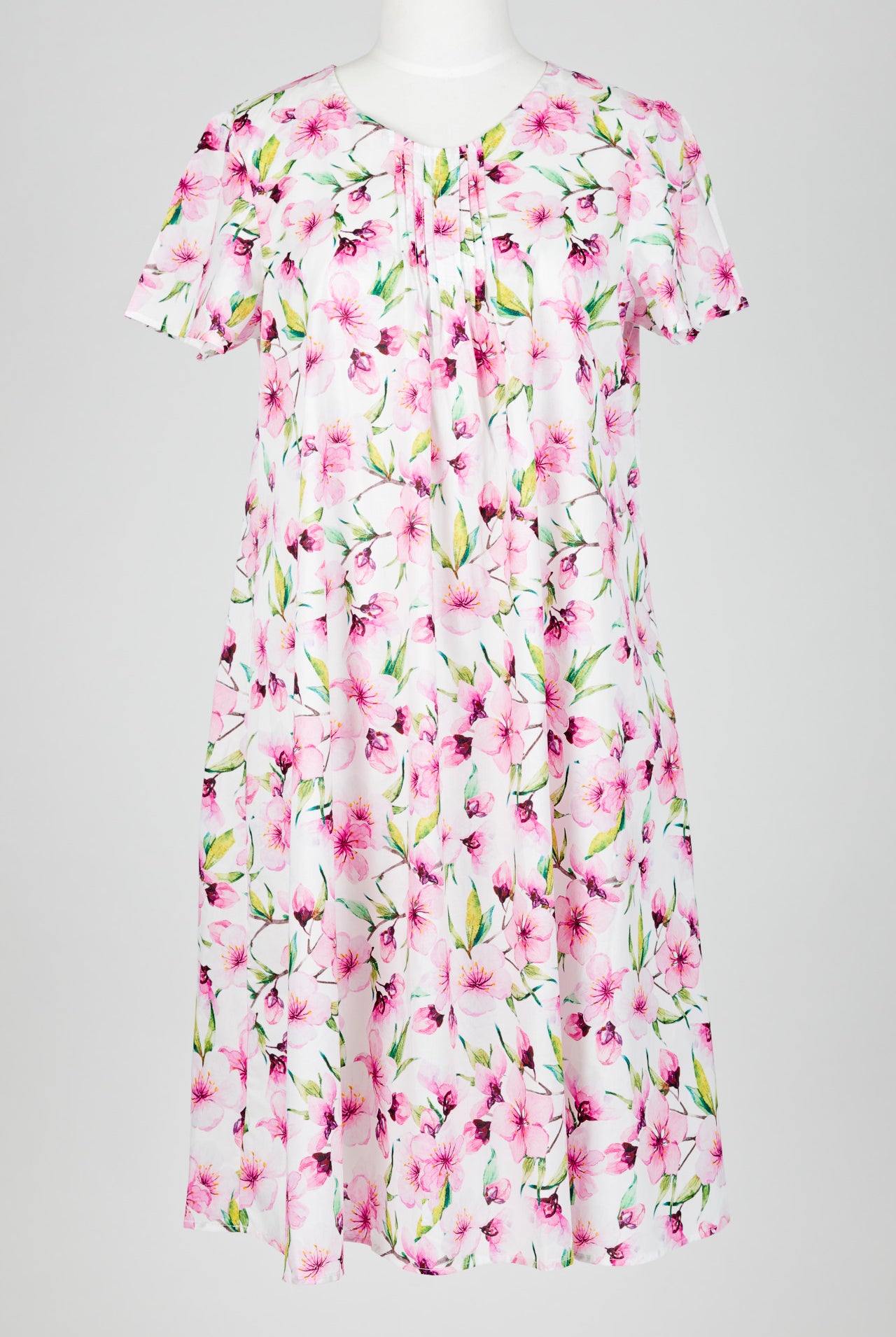 pink Floral patterned nightie dress on a mannequin against a white background