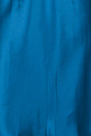 Blue silk satin nightgown with lace trim on a mannequin against a gray background