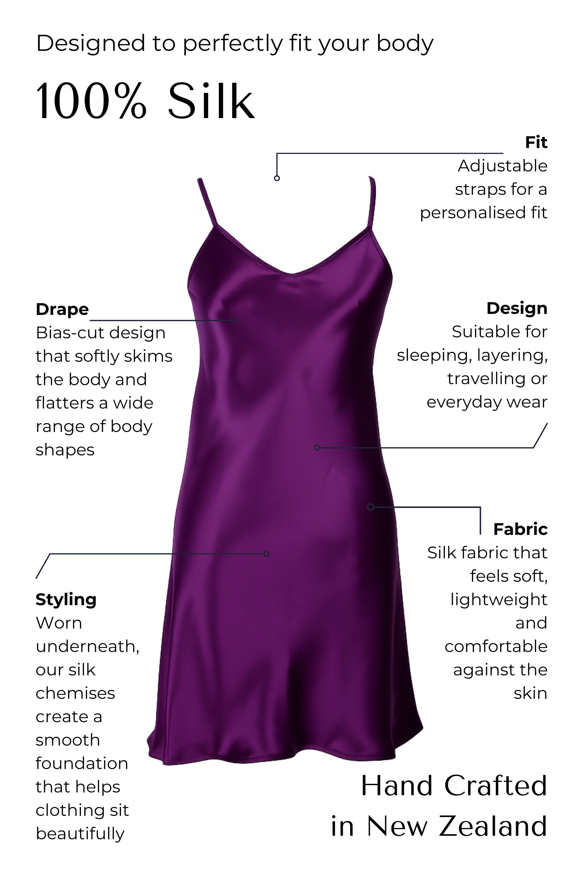 Purple silk slip dress with text describing its features on a white background