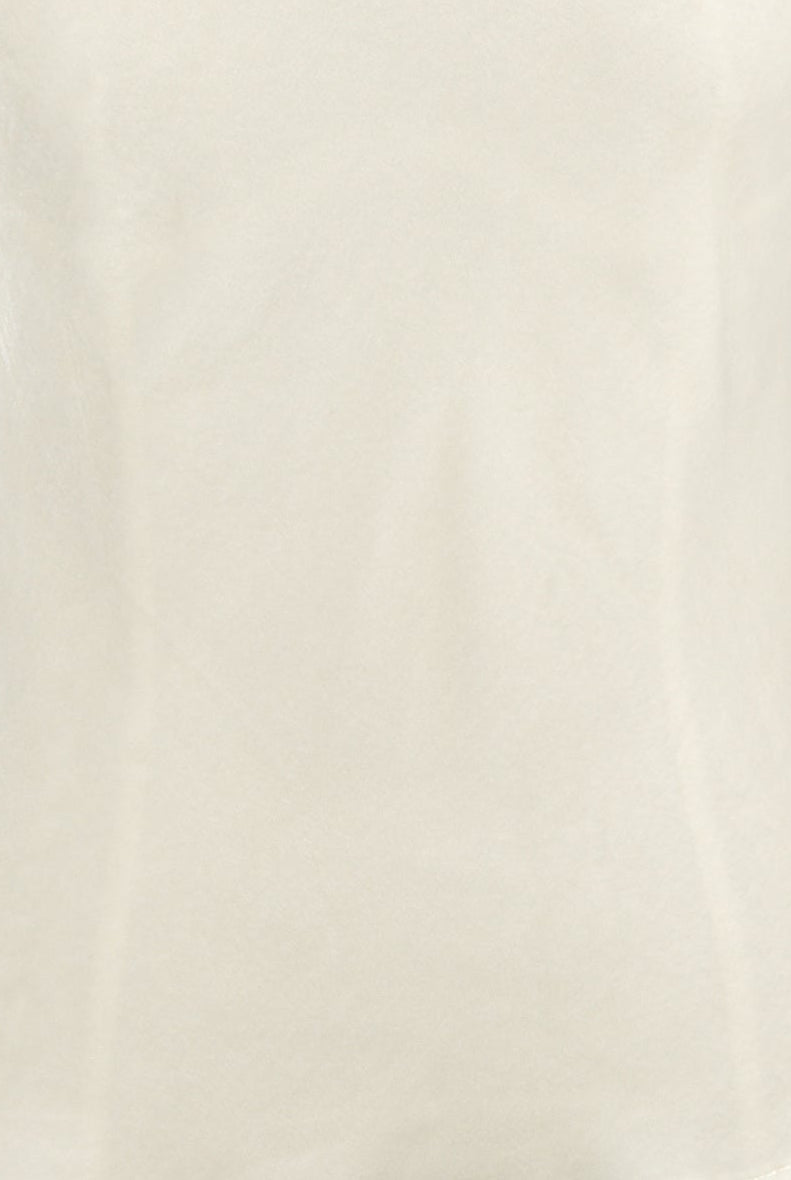 ivory silk velvet cami with a V-neck and adjustable spaghetti straps
