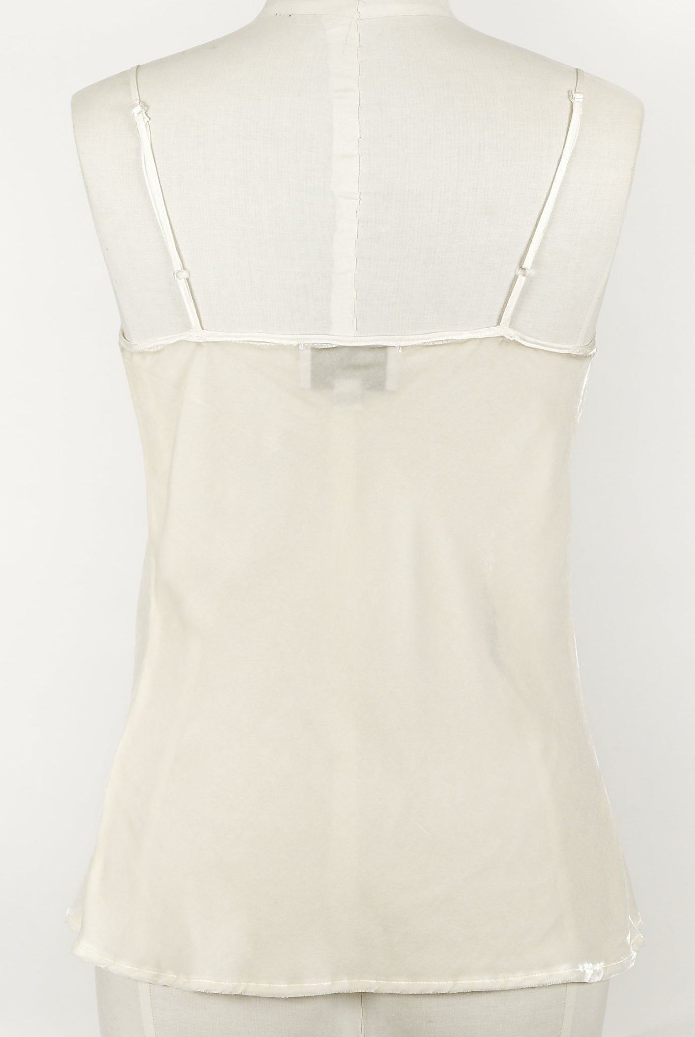 ivory silk velvet cami with a V-neck and adjustable spaghetti straps,