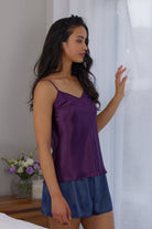 women wearing a purple silk camisole 