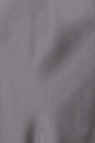 Grey silk slip dress up close on fabric detail
