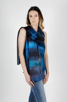 women wearing dark blue navy silk satin chiffon scarf with glow worm cave print 