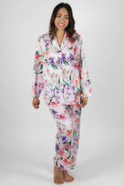 women wearing winter cotton floral pajamas with pink purple and orange flowers