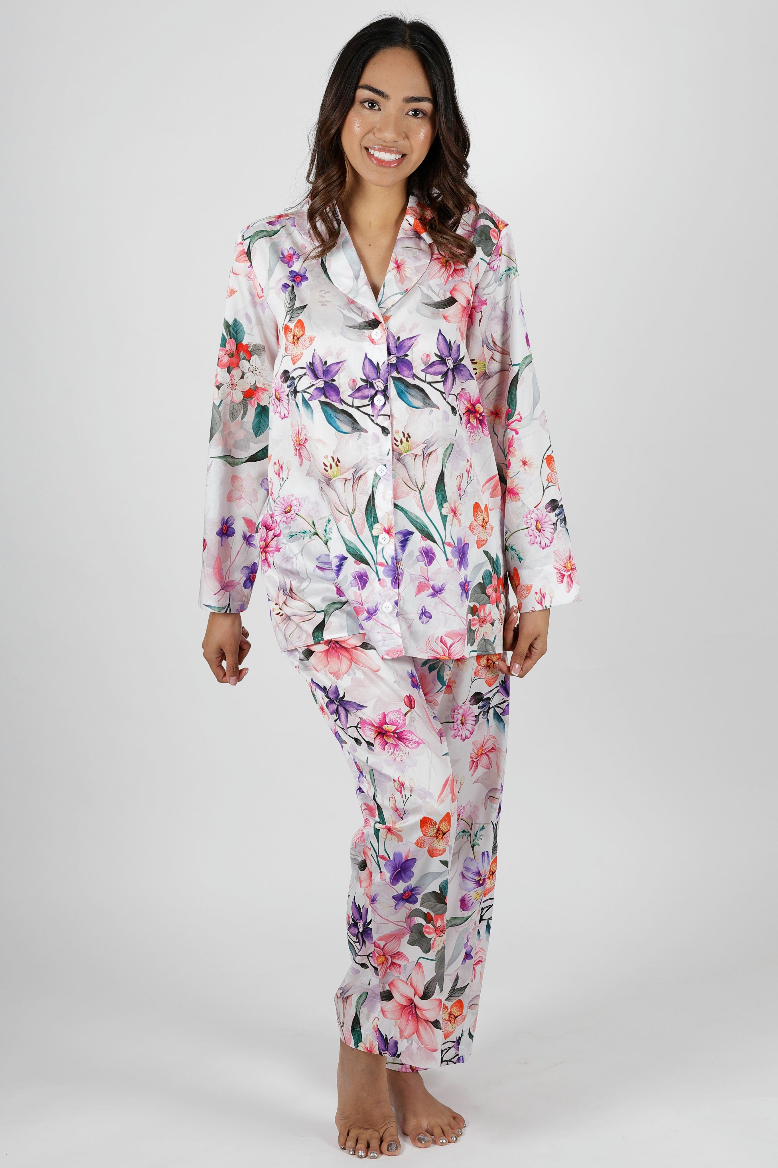 women wearing winter cotton floral pajamas with pink purple and orange flowers