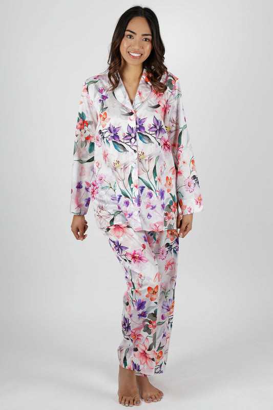 women wearing winter cotton floral pajamas with pink purple and orange flowers