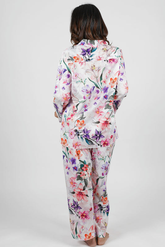 women wearing winter cotton floral pajamas with pink purple and orange flowers