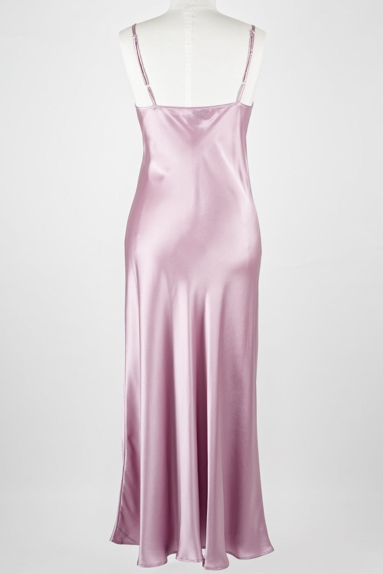 mannequin wearing a long light purple silk satin dress