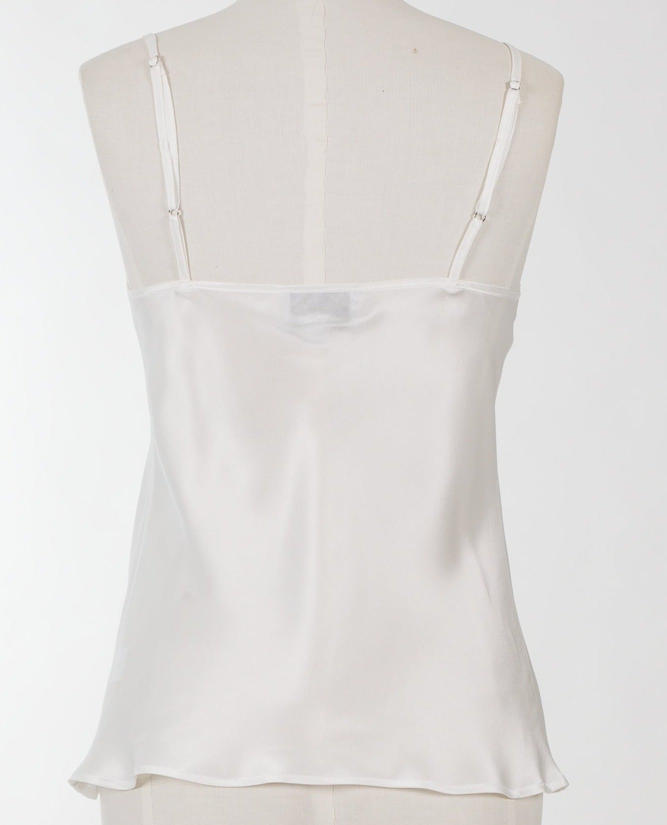 white silk cami on a mannequin