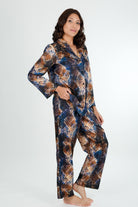 snake print of blue and gold cotton winter long sleeve pjs on a women