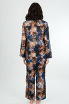 snake print of blue and gold cotton winter long sleeve pjs on a women