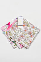 Set of floral-patterned fabric swatches on a light gray background