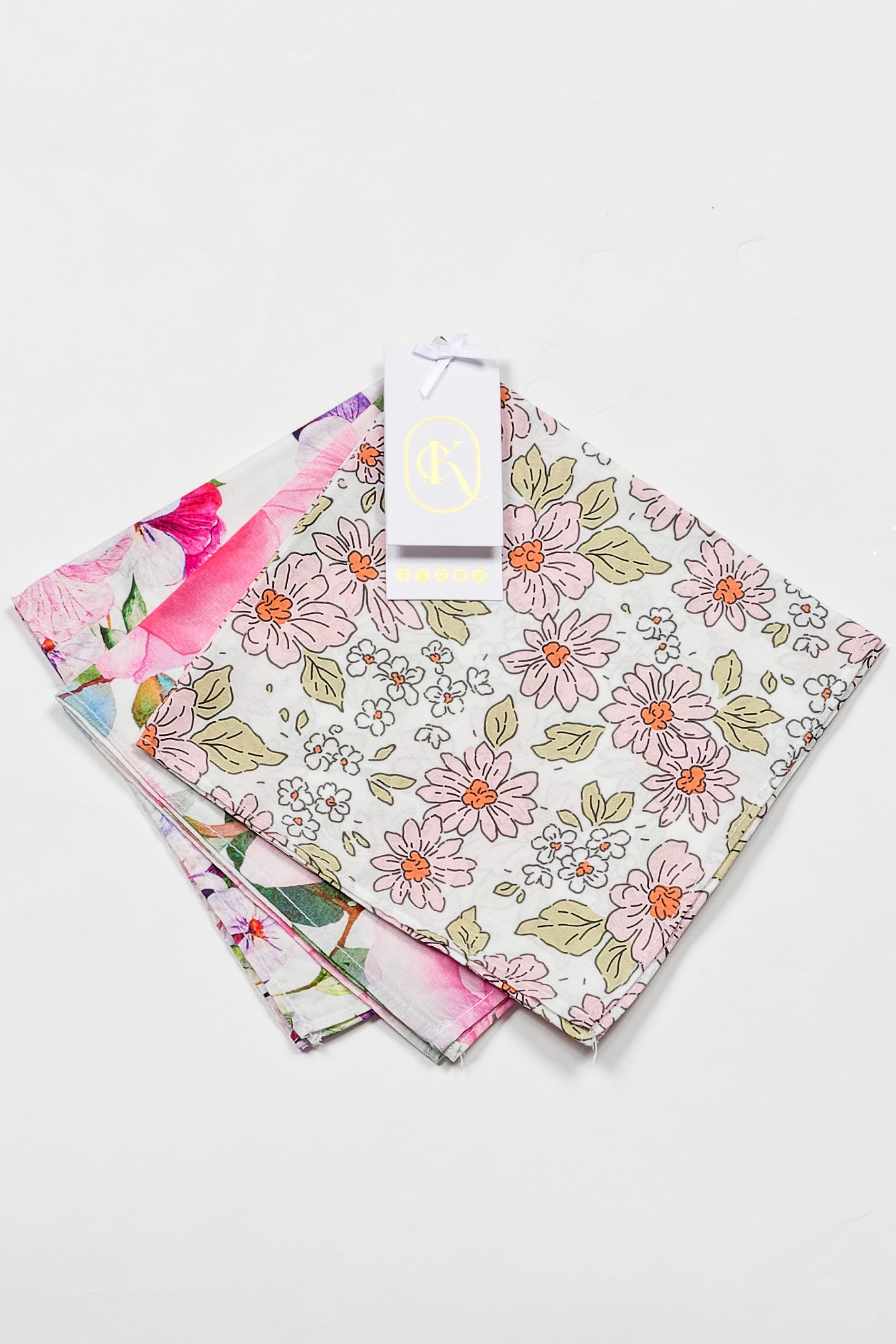 Set of floral-patterned fabric swatches on a light gray background
