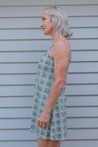 woman wearing cotton nightie dress with green and blue print