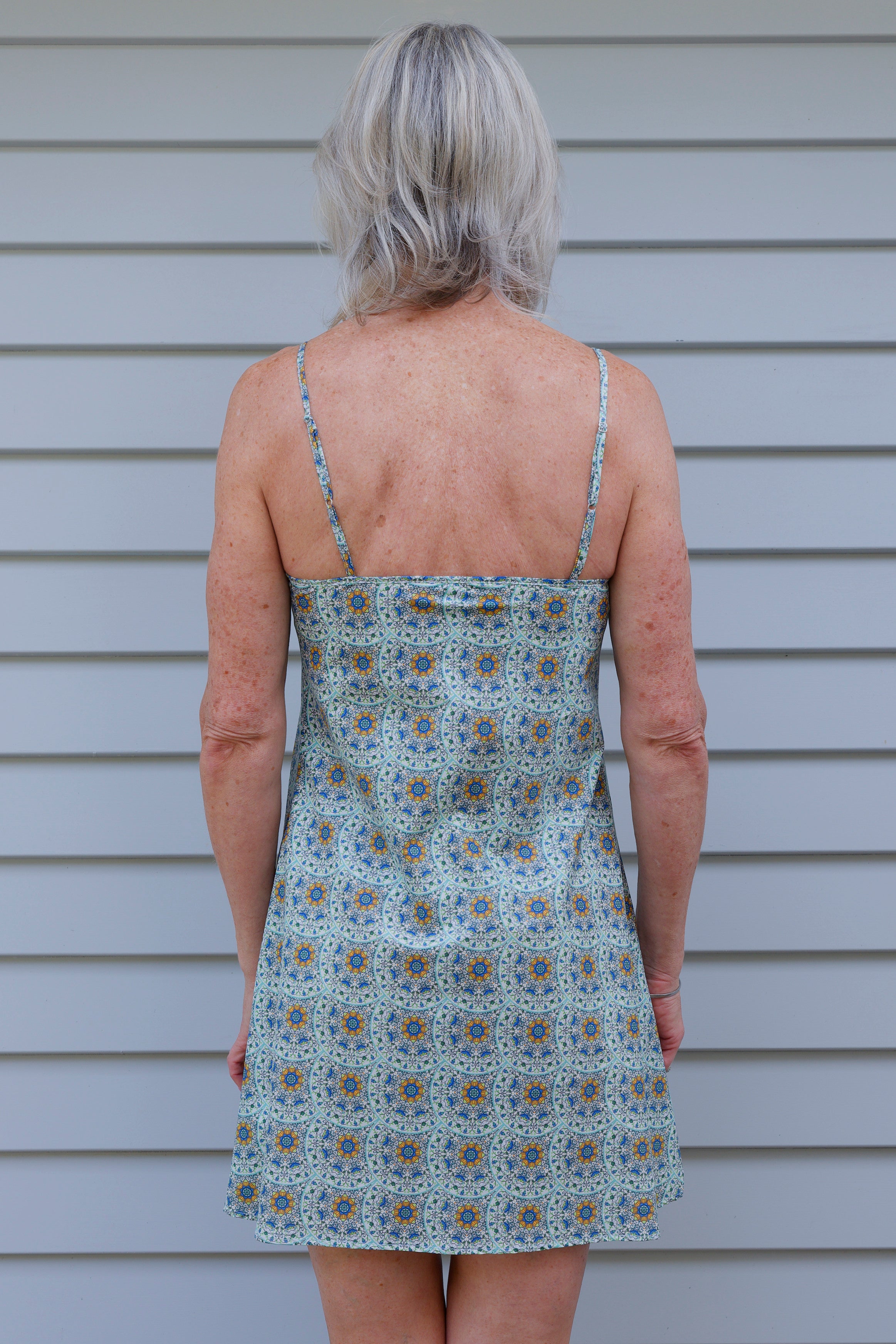 woman wearing cotton nightie dress with green and blue print
