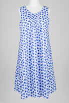 Blue floral cotton nightie dress on a mannequin against a gray background