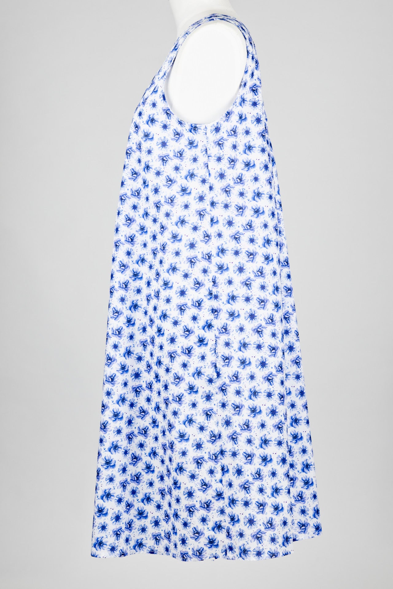 Blue floral cotton nightie dress on a mannequin against a gray background