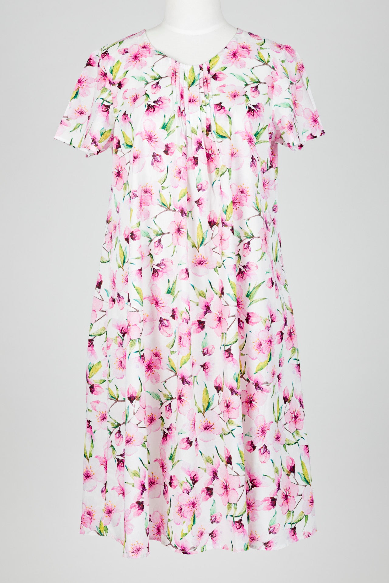 pink Floral patterned nightie dress on a mannequin against a white background
