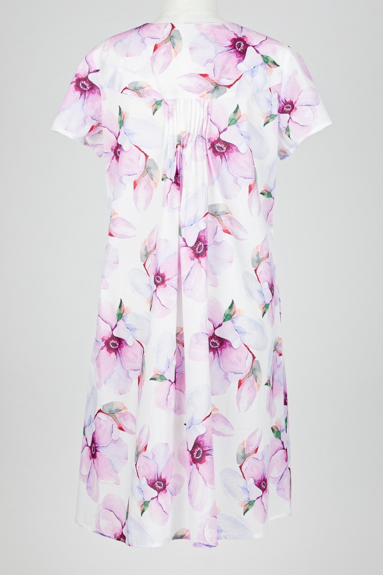pink Floral patterned nightie dress on a mannequin against a white background