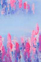 Abstract art with pink and blue brush strokes on a textured surface