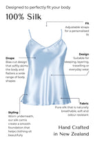 light blue Silk camisole with features highlighted on a black background