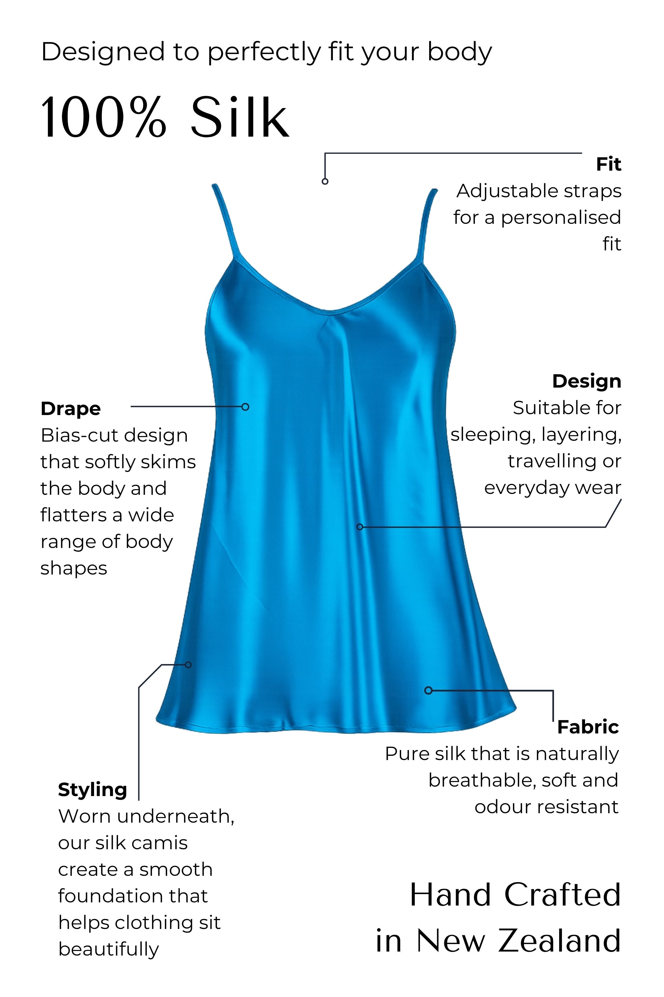 Blue silk camisole with features highlighted on a black background