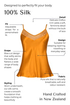 Orange bronze silk camisole with features highlighted on a white background