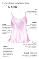 pink Silk camisole with features highlighted on a black background