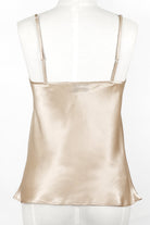  a silk camisole in a natural skin colour tone. has a V neck and adjustable straps