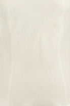  ivory silk velvet cami with a V-neck and adjustable spaghetti straps