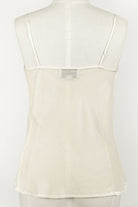 ivory silk velvet cami with a V-neck and adjustable spaghetti straps, 